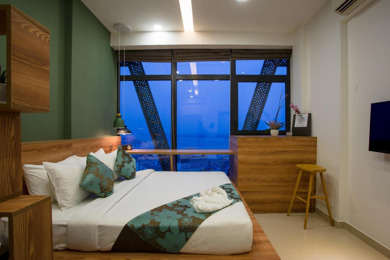 สโนว์เบลล์ แอท เดอะ บริดจ์ โฮเต็ล Hotel พนมเปญ ภายนอก รูปภาพ