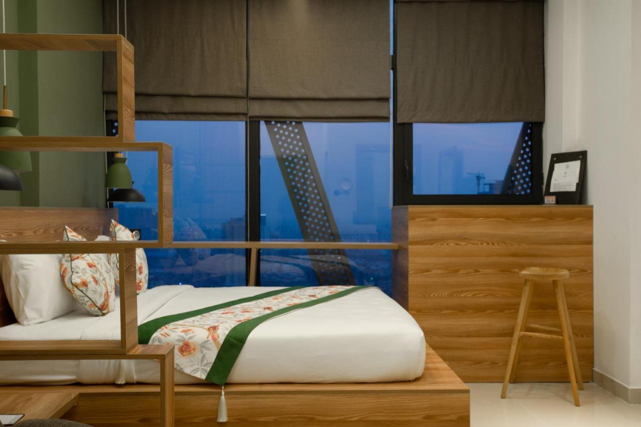 สโนว์เบลล์ แอท เดอะ บริดจ์ โฮเต็ล Hotel พนมเปญ ภายนอก รูปภาพ