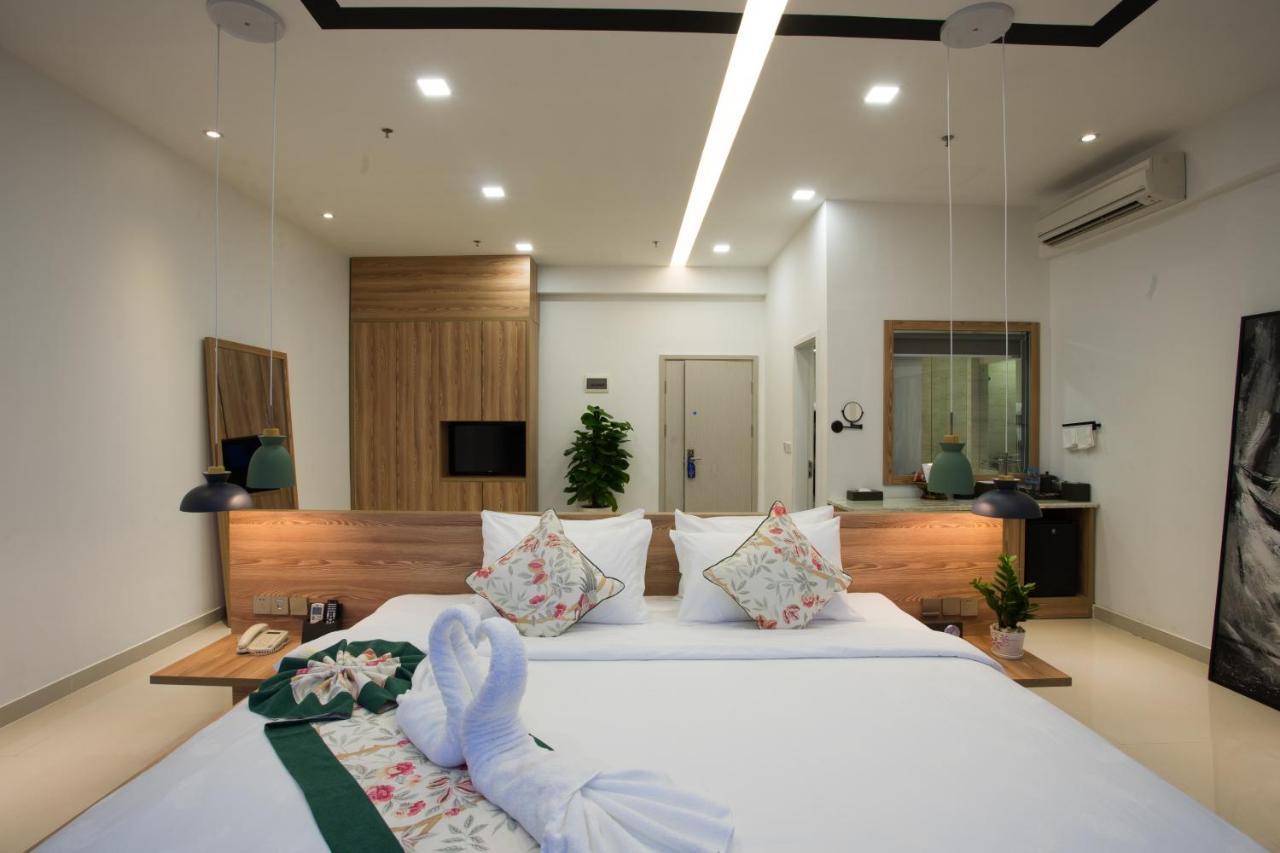 สโนว์เบลล์ แอท เดอะ บริดจ์ โฮเต็ล Hotel พนมเปญ ภายนอก รูปภาพ