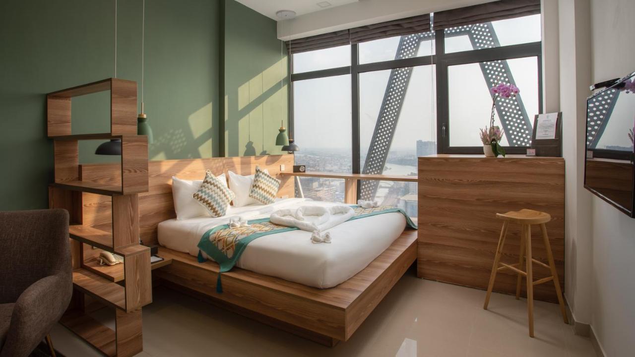 สโนว์เบลล์ แอท เดอะ บริดจ์ โฮเต็ล Hotel พนมเปญ ภายนอก รูปภาพ